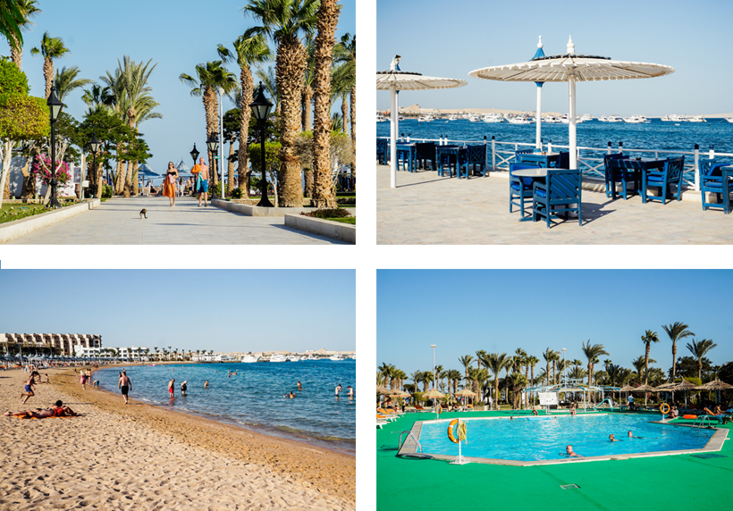 Gepflegte Palmenpromenade, Beach-Restaurant, Sand-Strand & Pool-Area im Grand Hotel Hurghada 